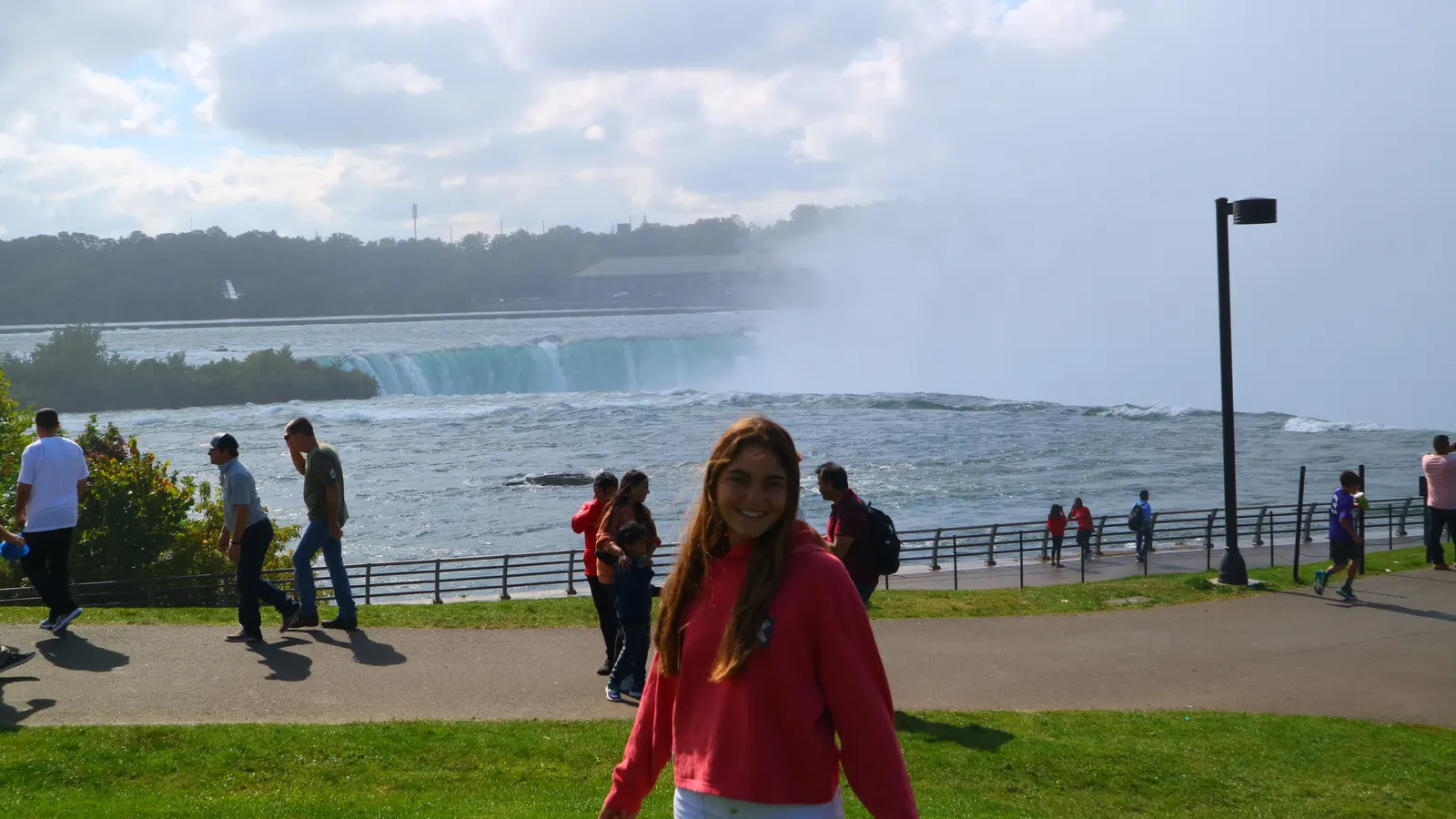 Raquel walking along the Niagara Falls promenade